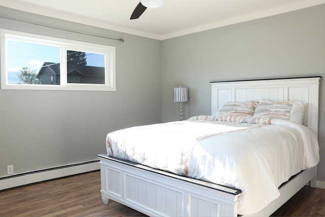 2060 Schilling St, Missoula, MT 59801 - bedroom with ceiling fan, ornamental molding, a baseboard heating unit, and dark wood-type flooring