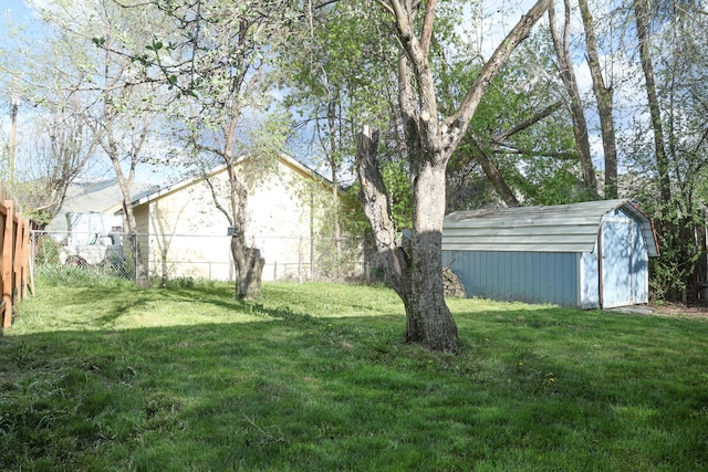 2060 Schilling St, Missoula, MT 59801 - view of yard with a storage shed, fence, and an outbuilding