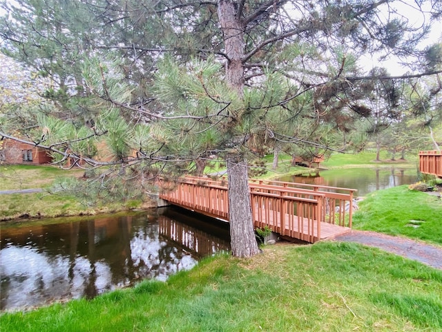 7 Brookside, Missoula, MT 59802 - view of dock with a lawn and a deck with water view