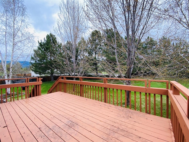 7 Brookside, Missoula, MT 59802 - deck with a lawn and a fenced backyard