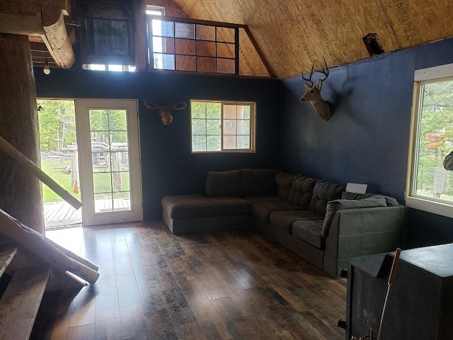 513 Spruce Gulch Rd, Helmville, MT 59843 - living area featuring healthy amount of natural light, hardwood / wood-style floors, wood ceiling, and high vaulted ceiling