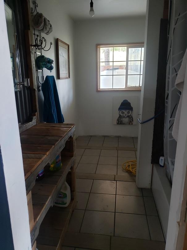 513 Spruce Gulch Rd, Helmville, MT 59843 - mudroom with light tile patterned floors