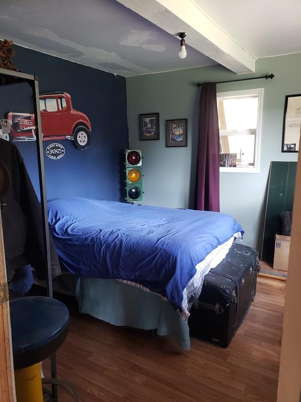513 Spruce Gulch Rd, Helmville, MT 59843 - bedroom with wood finished floors