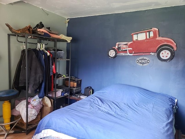 513 Spruce Gulch Rd, Helmville, MT 59843 - bedroom featuring wood finished floors