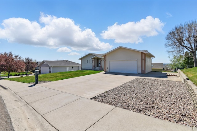 single story home with driveway, a front lawn, and a garage