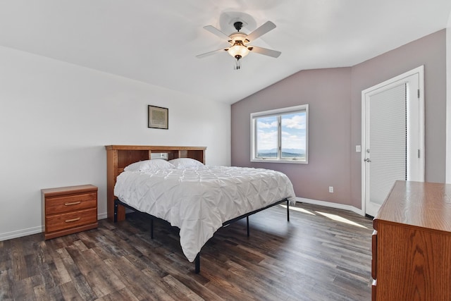 bedroom with baseboards, a ceiling fan, dark wood finished floors, and vaulted ceiling