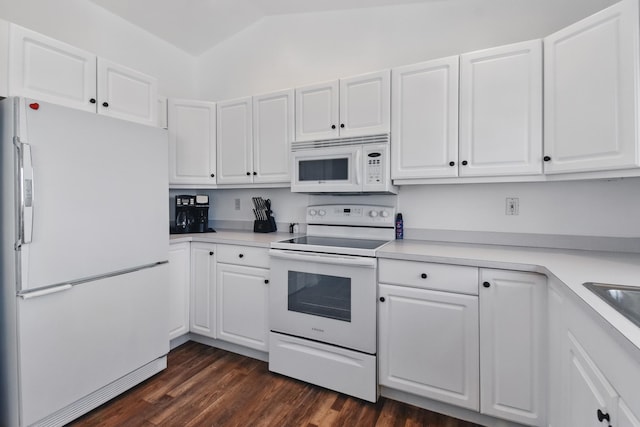 kitchen featuring light countertops, dark wood-style flooring, white appliances, and white cabinetry