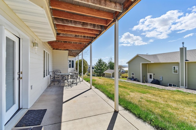 view of patio with outdoor dining area