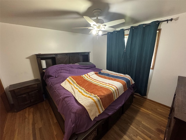 bedroom featuring ceiling fan and wood finished floors