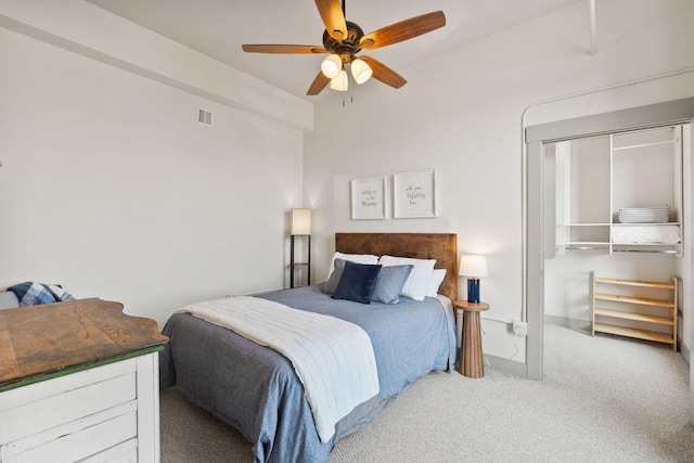 bedroom with ceiling fan, carpet, a closet, and visible vents