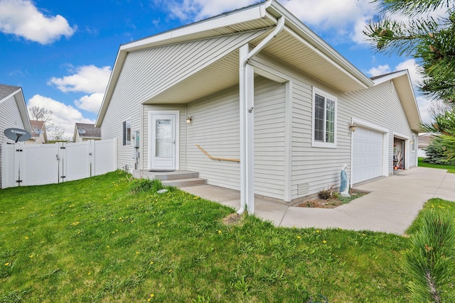 view of front of house with a front yard, a gate, a garage, fence, and concrete driveway