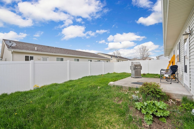 view of yard featuring a fenced backyard and a patio area