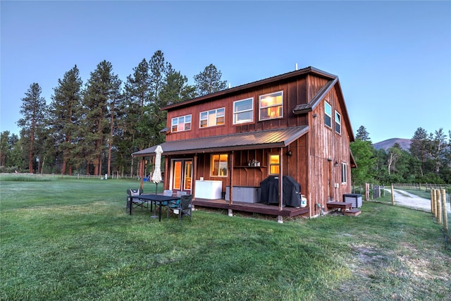 85 Martin Ln, Florence, MT 59833 - rear view of property with board and batten siding
