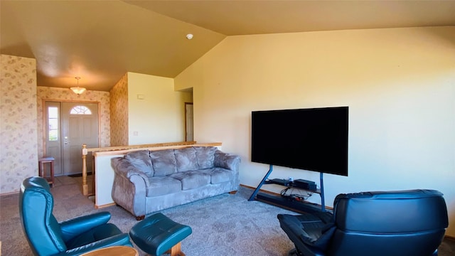 living area featuring carpet floors, wallpapered walls, and lofted ceiling