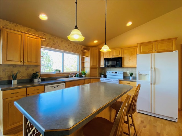 kitchen featuring dark countertops, open shelves, a sink, light wood finished floors, and white appliances