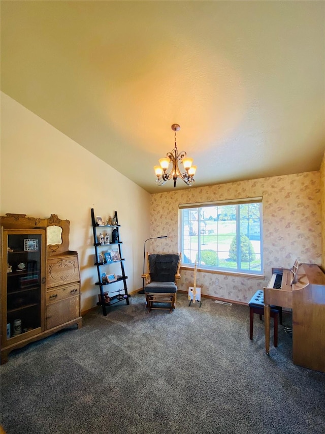 sitting room with an inviting chandelier, baseboards, carpet flooring, and wallpapered walls