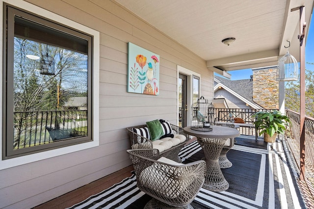 balcony featuring covered porch