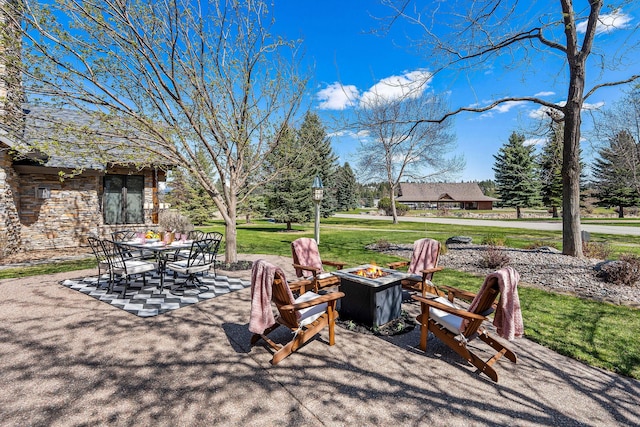 view of patio featuring an outdoor fire pit