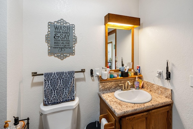 half bath with toilet and vanity