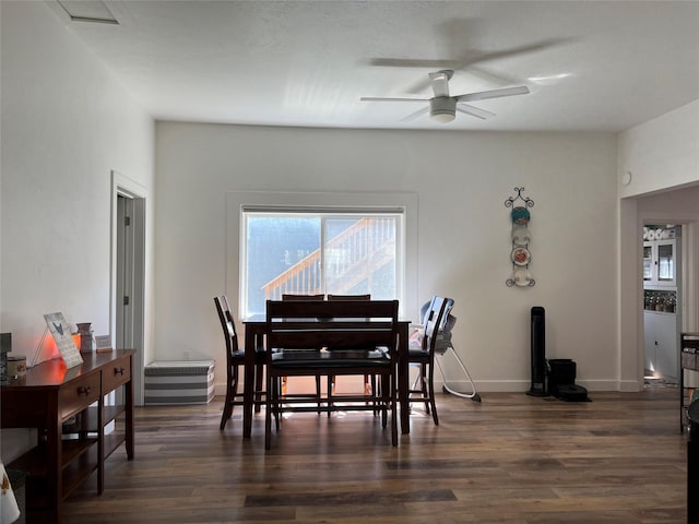 509 N 5th St, Hamilton, MT 59840 - dining room featuring dark wood-type flooring, baseboards, and ceiling fan