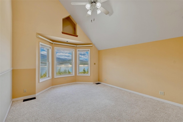 7100 Black Lake Rd, Rexford, MT 59930 - bonus room featuring carpet floors, ceiling fan, and vaulted ceiling
