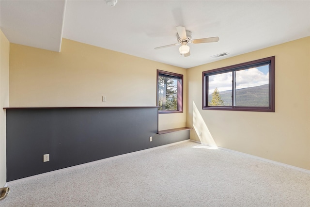 7100 Black Lake Rd, Rexford, MT 59930 - spare room with carpet flooring and ceiling fan