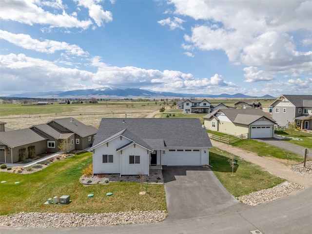 5498 Thimbleberry Loop, Helena, MT 59602 - drone / aerial view with a residential view and a mountain view