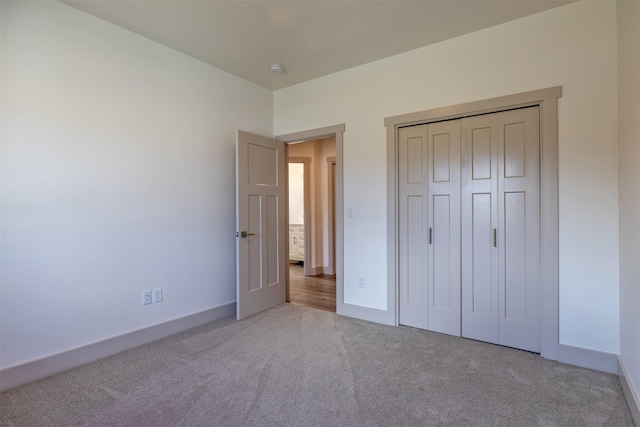 5498 Thimbleberry Loop, Helena, MT 59602 - unfurnished bedroom with baseboards, carpet, and a closet