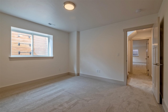 5498 Thimbleberry Loop, Helena, MT 59602 - unfurnished room featuring baseboards, light colored carpet, and visible vents
