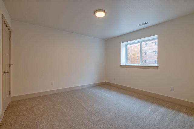5498 Thimbleberry Loop, Helena, MT 59602 - unfurnished room with baseboards, visible vents, and light carpet