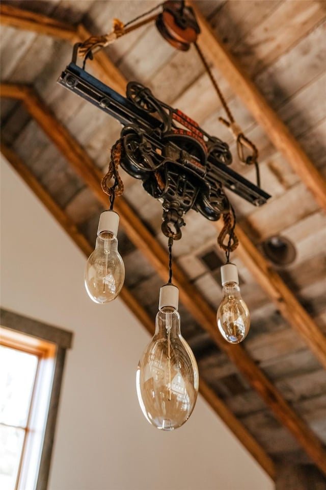 details featuring beam ceiling and wooden ceiling