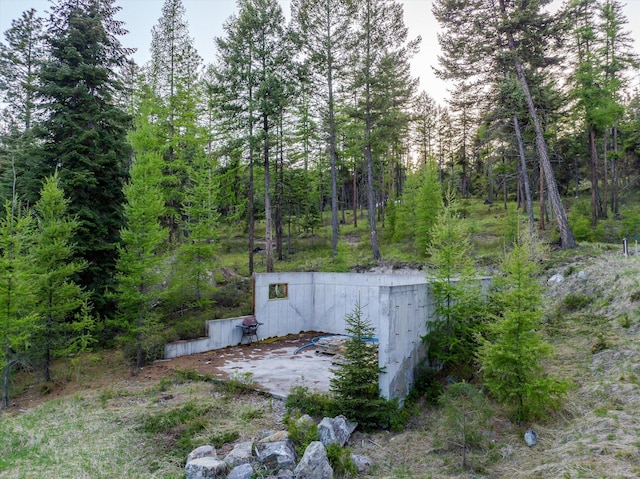 exterior space with a view of trees