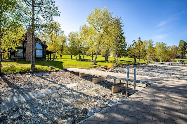 surrounding community with a yard