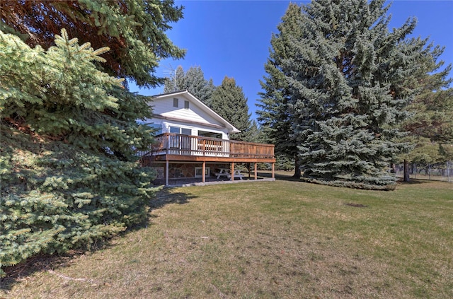 view of yard featuring a deck