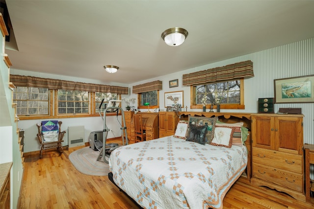 bedroom featuring light wood finished floors