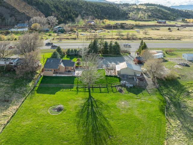 aerial view with a mountain view and a rural view