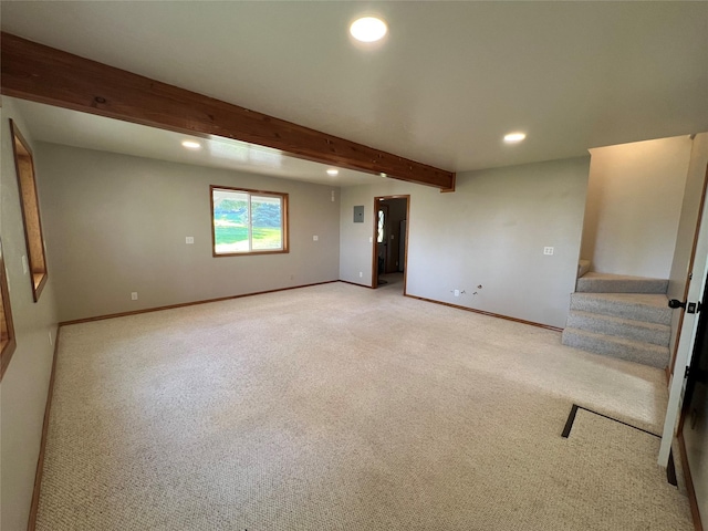 spare room with baseboards, light carpet, recessed lighting, and stairs