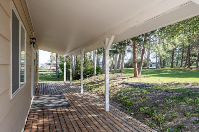 deck featuring a lawn