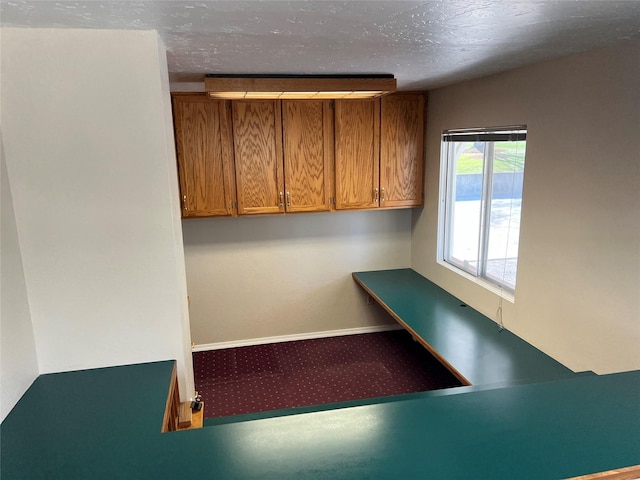 interior space featuring baseboards