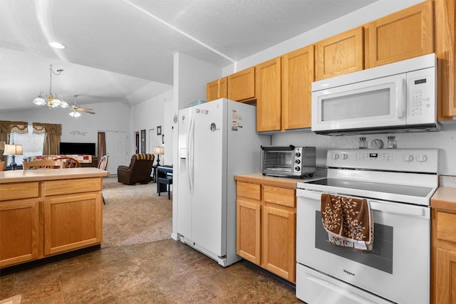 kitchen with white appliances, dark carpet, open floor plan, light countertops, and vaulted ceiling