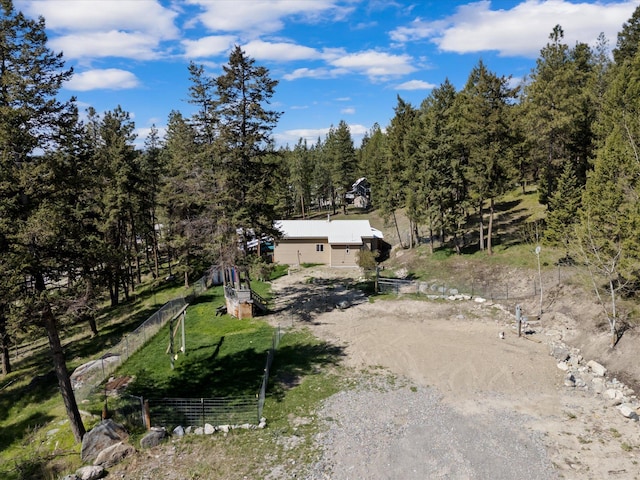100 Dawson Trl, Kalispell, MT 59901 - view of front of home with a forest view