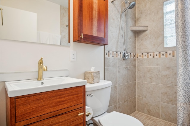1702 Bancroft St, Missoula, MT 59801 - full bath featuring vanity, toilet, and tiled shower