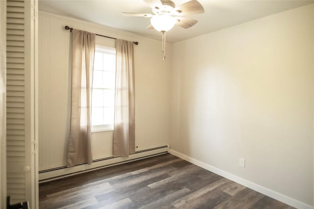 330 Bowman Rd, Hamilton, MT 59840 - unfurnished room with a baseboard radiator, ceiling fan, and dark wood finished floors