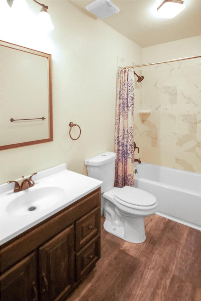 330 Bowman Rd, Hamilton, MT 59840 - full bath featuring vanity, shower / bath combination with curtain, and wood finished floors