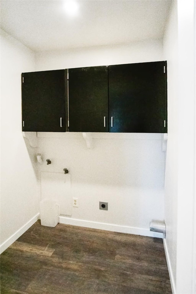 330 Bowman Rd, Hamilton, MT 59840 - laundry area featuring cabinet space, wood finished floors, and electric dryer hookup