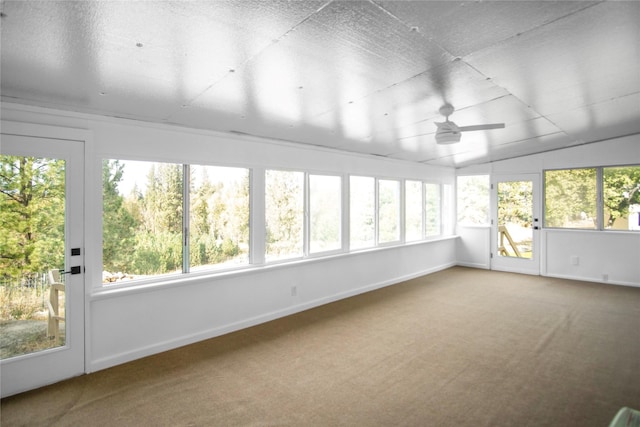 330 Bowman Rd, Hamilton, MT 59840 - unfurnished sunroom featuring plenty of natural light, carpet flooring, and vaulted ceiling