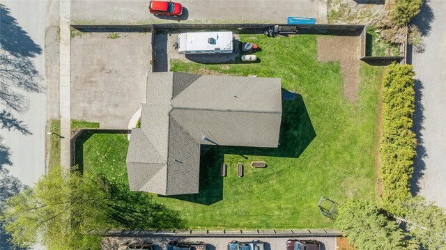 1020 3rd Ave E, Columbia Falls, MT 59912 - drone / aerial view featuring a view of trees and a mountain view