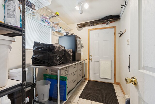 1020 3rd Ave E, Columbia Falls, MT 59912 - interior space with light tile patterned floors