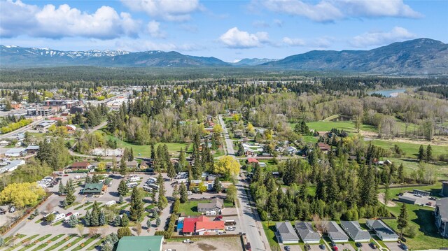 1020 3rd Ave E, Columbia Falls, MT 59912 - aerial view featuring a mountain view and a wooded view