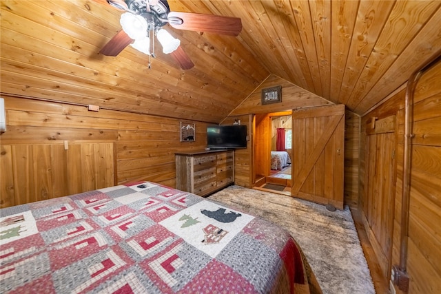 bedroom featuring wood walls, wood ceiling, and vaulted ceiling